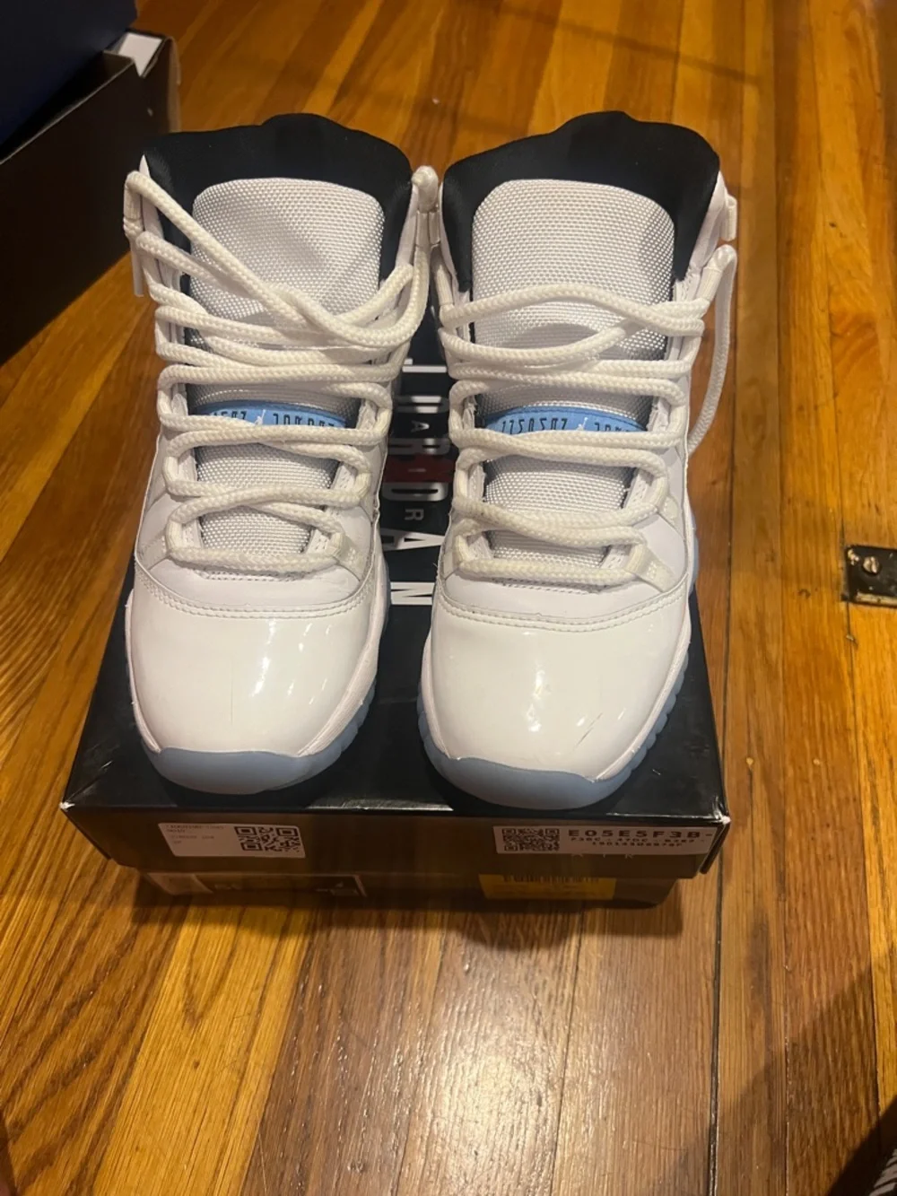 Jordan Kids White and Black High-Top Sneakers with Light Blue Jumpman - Picture 2 of 5